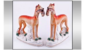 Staffordshire Early Pair Of 19th Century Whippet Dog Figures. Circa 1860's. Each 11.25 inches high.