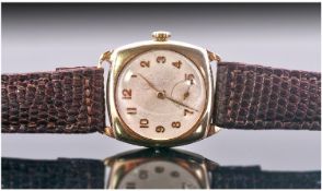 9ct Gold Boys Size Manual Wind Wrist Watch. Circa 1940's. Fitted on a brown leather strap. Working