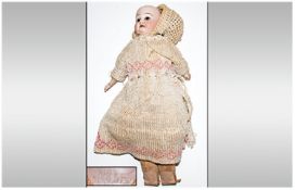 Late 19th Century Bisque Headed German Baby Doll, With composite and cloth body, looks to be