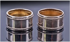 A Rare Pair Of Miniature Silver Novelty Children's Napkin Rings. Each with beaded edges. German