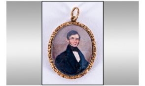 English School circa 1840, portrait of a clergy man, in carved gilt foliate frame. Size 52 x 40mm.