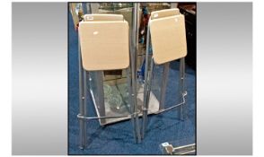 Pair Of Collapsible Bar Stools, Light brown laminate on grey frame.