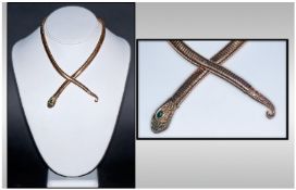 Georgian Style Snake Chain, with diamond set tail, the head surmounted with emeralds and diamonds.