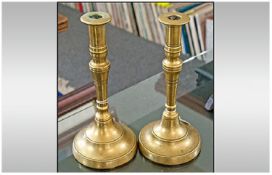 Pair Of 18th/19th Century Brass Candlesticks. Each 10 inches.