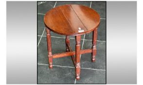 Small Mahogany Miniature Drop Leaf Side Table. Raised on fluted foldable legs, diameter 16.5