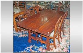 A Reproduction Walnut Table in the Spanish Style of an Eighteenth Century table. 3 Plank rectangular