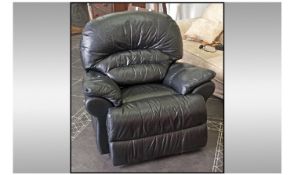 Modern Contemporary Black Leather Reclining Electric Arm Chair. Looks to be in good working order.