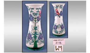 Moorcroft Modern Tall Vase. Birds and plums design. Stands 12.25 inches high.