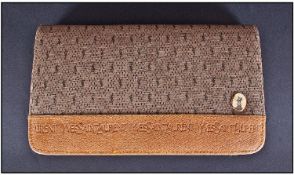 Yves Saint Laurent style clutch bag, with integral purse, in a taupe monogram fabric with tan