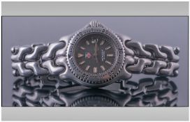 Ladies Tag Heuer Wristwatch, with Slate Dial, Luminous Baton Markers, And Date Aperture, Marked