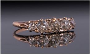 Ladies 18ct Gold Diamond Ring, Set With Five Graduating Old Cut Stones In A Gallery Setting.