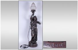A Large Composite Bronzed Table Lamp depicting Marianne, Goddess of Liberty, Overall height