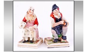 Staffordshire Early 19th Century Pair Of Figures. The cobbler and his wife Polly Pentreath, The last