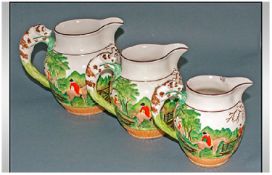 Three Staffordshire Graduating Jugs, Raised hunting scenes, the handle with bloodhounds. Painted
