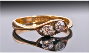 Edwardian 18ct Gold And Platinum Set Two Stone Diamond Ring. The cushion set diamonds of good