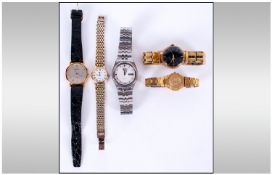 A Collection OF Wristwatches, 5 in total, 1. Smiths De Lux gilt metal manual wind wristwatch, 2.