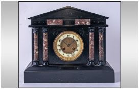 Black Slate Victorian Clock in the classical style. With enamel chapter ring with apex top. 14