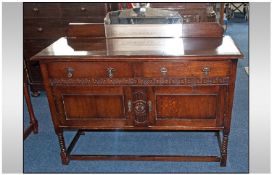 Early To Mid 20th Century Carved Sideboard. With Small Mirrored Back, two Draws Above Two Storage