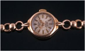 Rotary 9ct Gold Manual Wind Ladies Wristwatch fitted on a 9ct gold strap. Circa 1960's. Fully