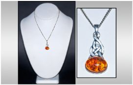 Modern Amber Set Silver Pendant, Suspended On A Silver Chain.