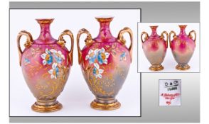 Pair of Delinieres Limoges Hand Decorated Ovoid Vases, each vase hand painted with opposing