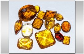 Collection Of Approximately 17 Loose Citrine Gem Stones. Estimated 100 cts. Various Shapes And