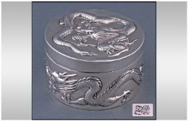 Antique Chinese Silver Lidded Box. Finely embossed with dragons. Stamped to the base with Chinese