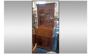 A Small Antique Sheraton Style Mahogany Secretaire Bookcase, with a fitted centre drawer/bureau,