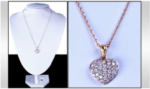 18ct Gold Heart Shaped Pendant Pave Set With Diamonds. Fitted on an 18ct gold chain. Over 1ct of