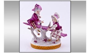 Rudolstadt Volkstedt Figure Group showing two children in elegant 18thC dress playing on a
