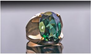 8ct German Dress Ring Set With A Large Oval Green Faceted Stone. Stamped 333. Ring Size O.