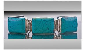 Silver Mounted Bracelet, Stamped 925. Set With 5 Square Polished Turquoise Coloured Stones.