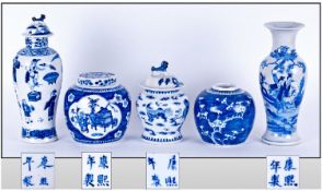 Five Antique Chinese Blue And White Vases. One decorated with elegant ladies with a deer in a