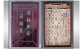 A Fine Chinese Mah Jong Set In A 19th Century Hardwood Sliding Box. Chinese characters in green