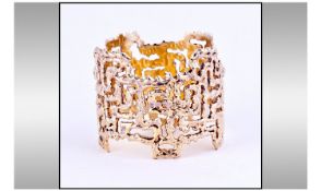Stuart Devlin. A fine silver gilt castellated cage work napkin ring. Hallmarked for London 1973 by