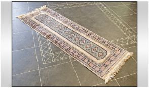 Small Persian Type Carpet, 24 by 78 inches.