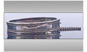 Silver Hinged Bangle. With Raised Moulded Detailed Front. Engraved Name. Clasp Marked Sterling.