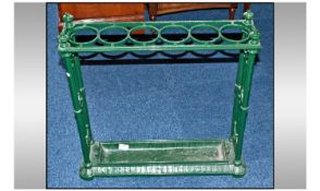 Cast Iron Reproduction Stick Stand painted green with ring apertures to top. 24`` x 24``