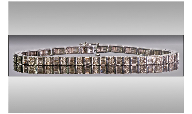 Ladies 9ct White Gold Set Baguette and Brilliant Cut Diamond Bracelet. The Diamonds of Good Colour