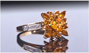 9ct Gold Dress Ring. Set with A Central Cluster Of Mixed Cut Citrines. Round Cut Diamond Set