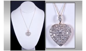 15ct Gold Heart Shaped Pendant. Pave Set With Round Modern Brilliant Cut Diamonds with a Diamond