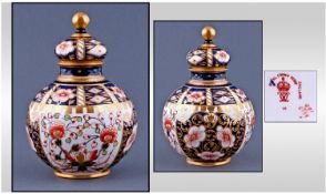 Royal Crown Derby Imari Pattern Lidded Globular Shaped Vase. Date 1906. Stands 6 inches high.