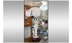 Florence Guiseppe Armani Table Lamp. Base with a ceramic figure of a woman and dog. Cream shade