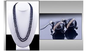 Art Deco Style French Hand Knotted Faceted Bead Necklace. Length 46 inches. Together with Black