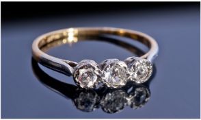 18ct Gold And Platinum Set 3 Stone Diamond Ring. Marked 18ct and platinum. Circa 1920`s.