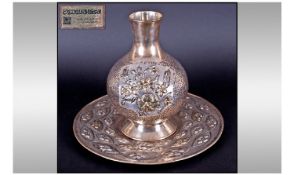 Egyptian White Metal Embossed And Decorative Vase And Stand. Vase 10.5 inches high, stand 14 inch