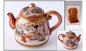 Japanese Satsuma Miniature Teapot.  Early 20th Century. Decorated with images of Domestic Scenes