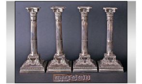 Victorian Fine Set Of Four Silver Classical Corinthian Column Candlesticks. Raised on Spreading