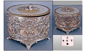 Victorian Silver Plated Oval Biscuit Barrel with an embossed decorative body in the Gothic style of