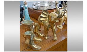 Collection Of Assorted Brass Ware. Comprising an elephant figure, 3 ladies boots, lidded pot with